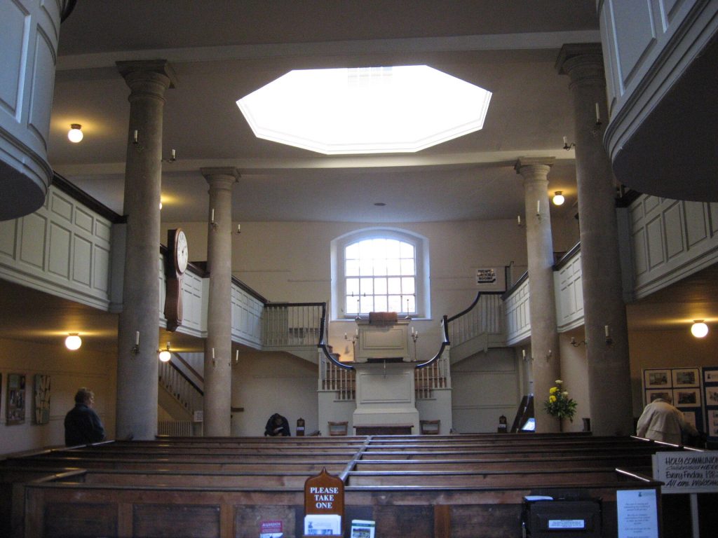 A historic chapel interior representing early places of worship for Methodist ancestors.